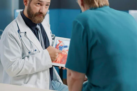 general-practitioner-holding-tablet-with-heart-condition-Medical-Research-Facility-in-Tampa-&-Partner-for-Clinical-Trials